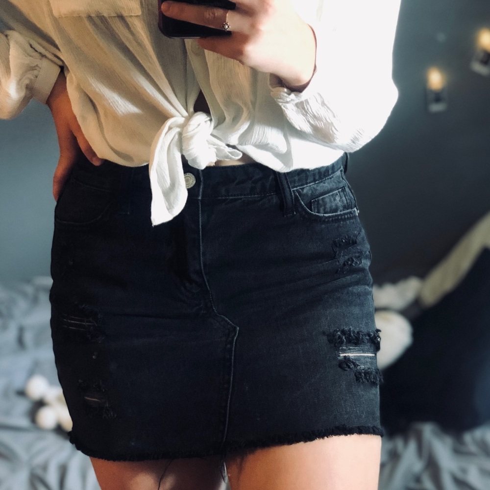 Black distressed mini skirt